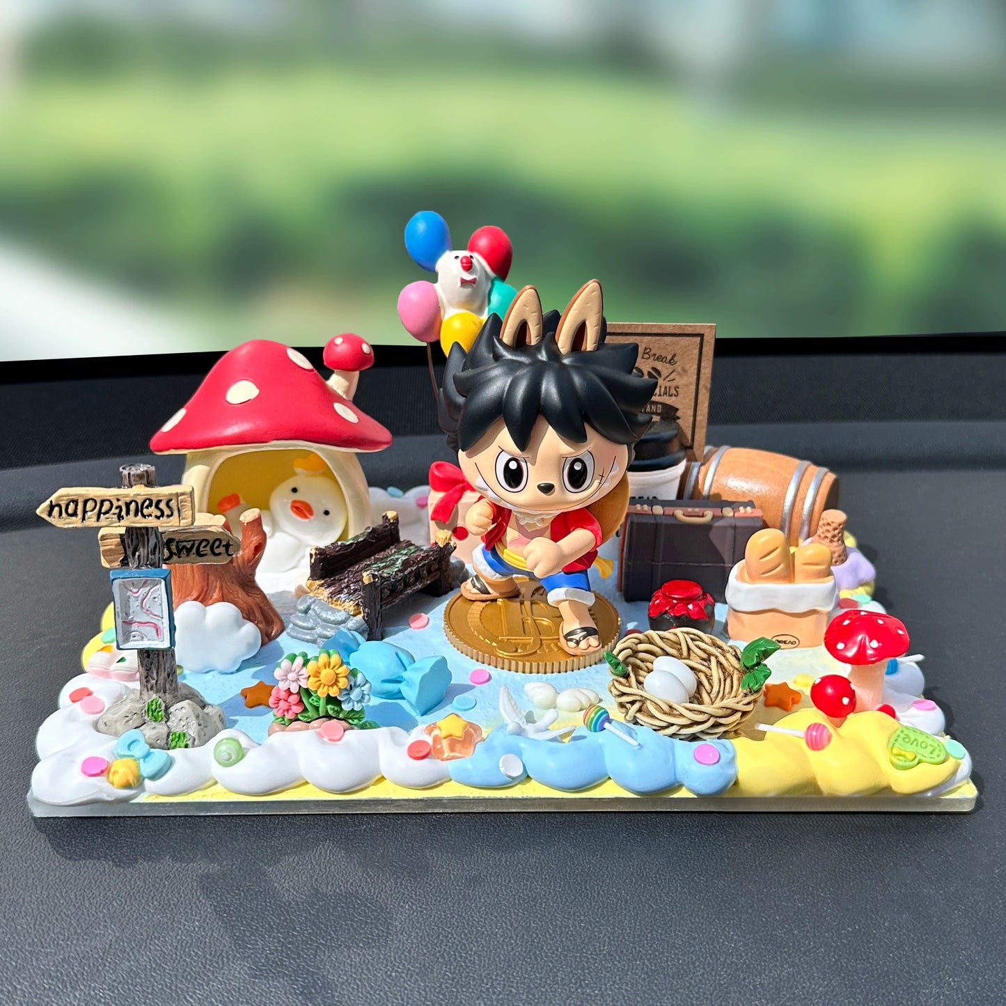 anime pirate dashboard figure with island scene – one piece inspired car decor