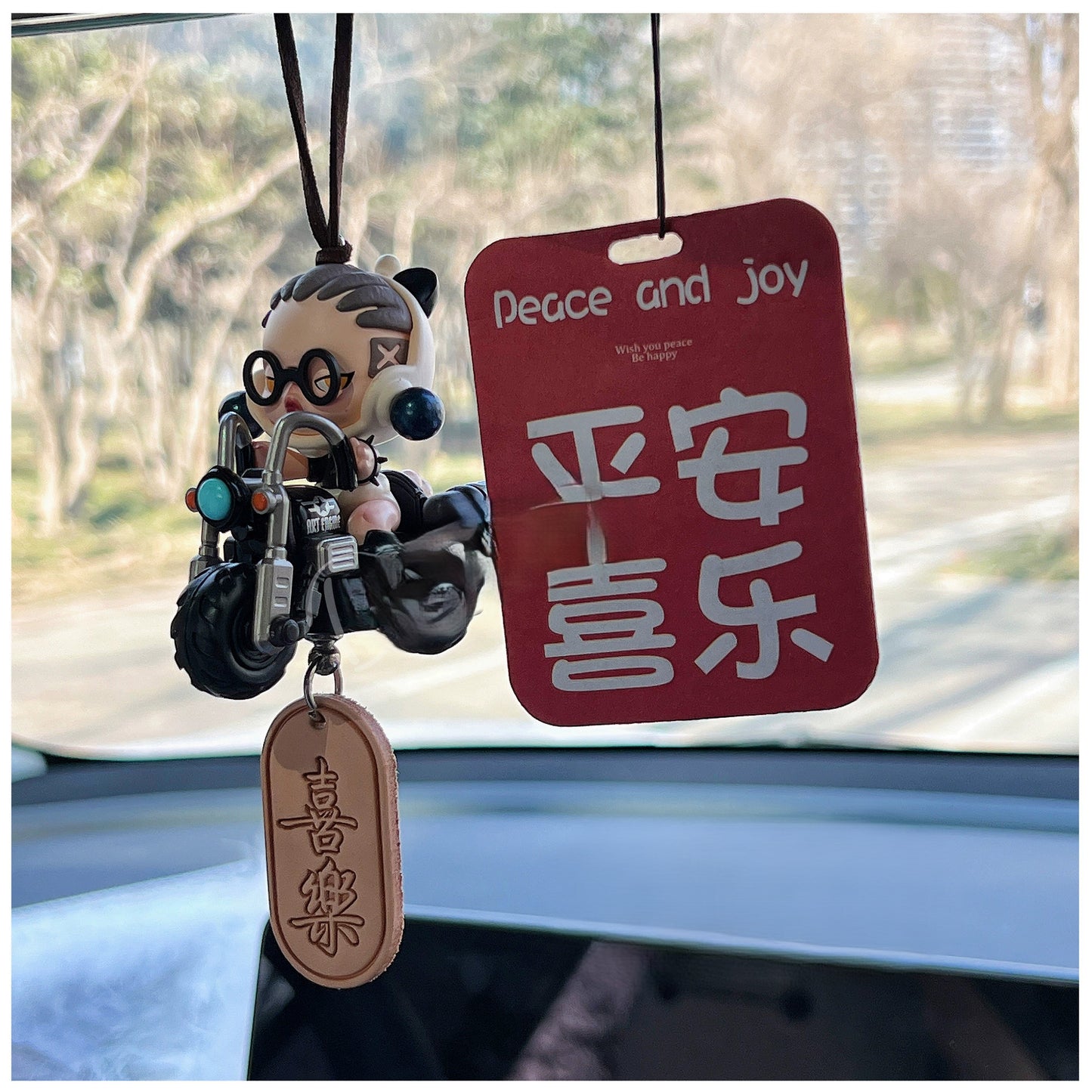DriveHustle Morning Rush limited edition taxi driver dashboard figurine with motivational tag hanging in car interior