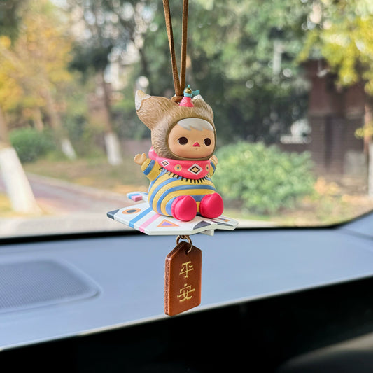 Luvbubu BubbleBear charm doll in pink outfit with bear hoodie and crystal ball, hanging on car dashboard with Lucky tag