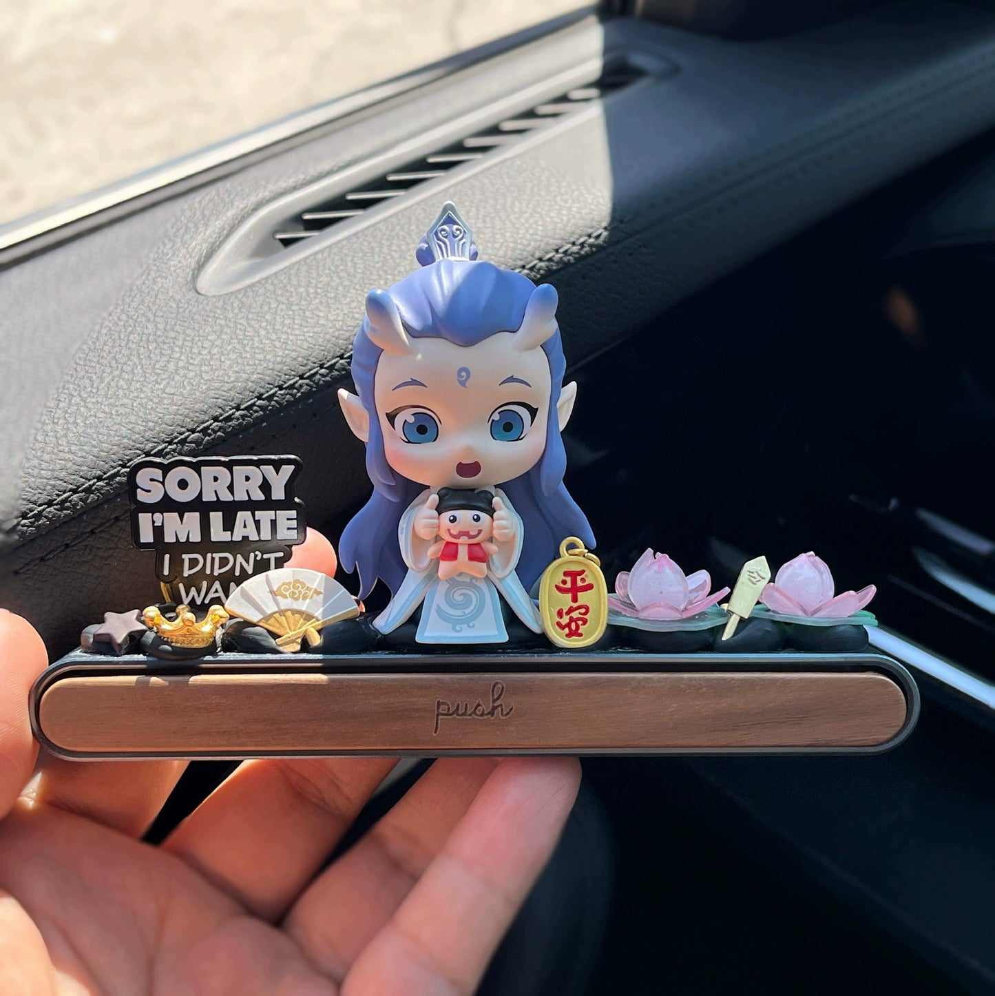 Chinese myth-inspired dashboard ornament with gift box and hidden magnetic parking plate