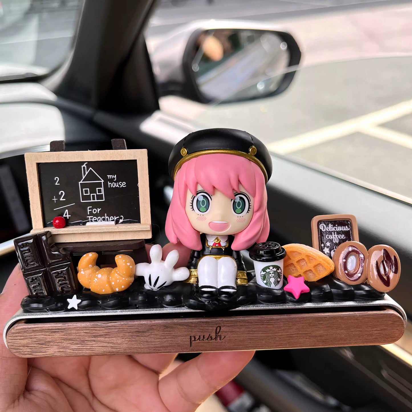 anya inspired anime dashboard doll with pink hair plushie and hidden parking plate