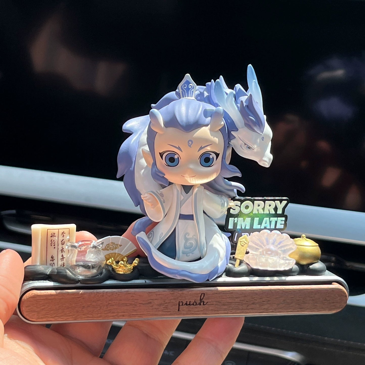 Chinese myth-inspired dashboard ornament with gift box and hidden magnetic parking plate